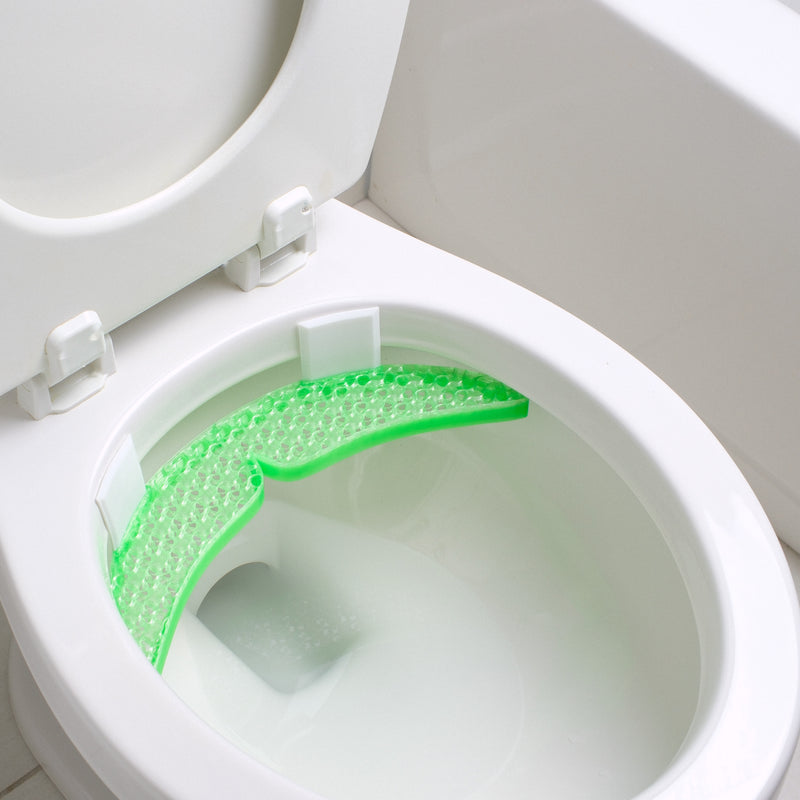 Green Splash Stache installed on the back rim of a toilet bowl